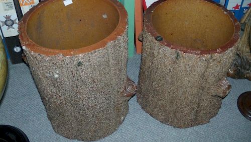 A pair of early 20th century Hexter Humpherson and Co. Newton Abbot brown salt glaze planters, model