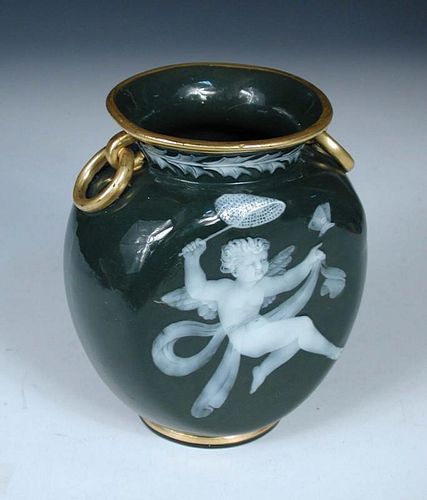 A George Jones pate sur pate vase, attributed to Frederick Schenk, worked with an amorini about to n