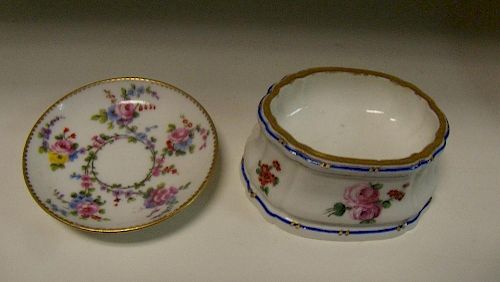 An 18th century Sevres trencher salt together with a small dish painted respectively by Morin and Ta