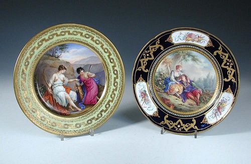 A 19th century Vienna plate painted with Diana the huntress seated on her red cloak by a bluff chosi