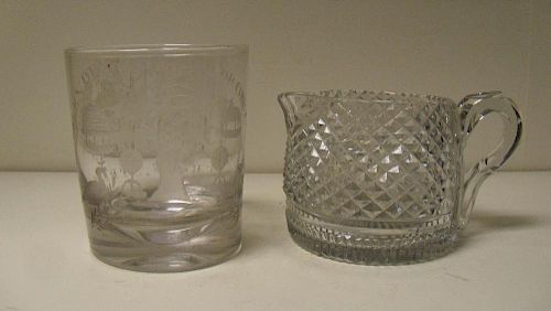 An 'Oddfellows' tumbler and a cream jug, possibly Irish, the tapering cylindrical sides of the tumbl