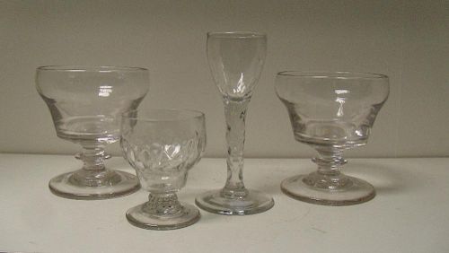A pair of 19th century rummers, an 18th century wine and a jelly glass, the ogee bowls of the rummer