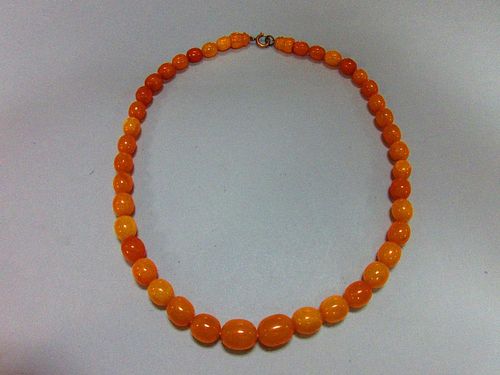 An amber necklace, of graduated oval butterscotch beads, gross weight 18g, length of necklace 42cm <