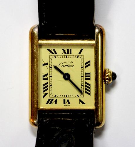 By Cartier - a lady's silver gilt 'Must de Cartier' quartz 'Tank' wristwatch, the rectangular champa