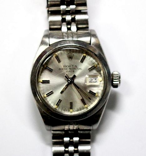 By Rolex - a lady's steel cased 'Oyster Perpetual Date' automatic wristwatch, silvered dial with bat
