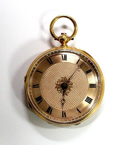 By Buller & Hutchinson - an 18ct gold open face fob watch, the engine turned gold coloured dial with