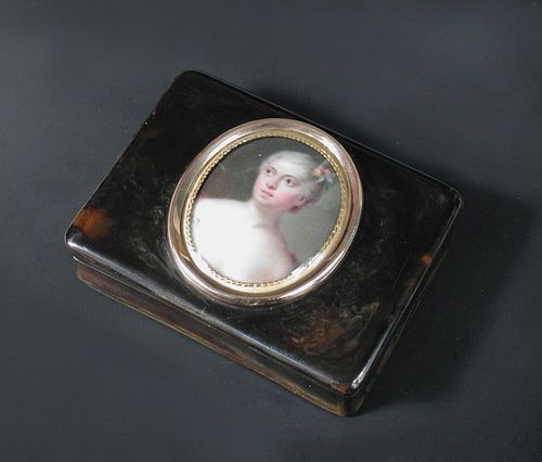 An early 19th century tortoiseshell portrait snuff box of rectangular form, the cover applied with a