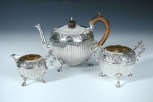 A Victorian silver three piece teaset, by Charles Stuart Harris, London 1878, the teapot of globular