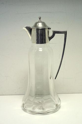 A plain glass claret jug with silver mount, by William Hutton & Sons, Birmingham 1919, the bell shap