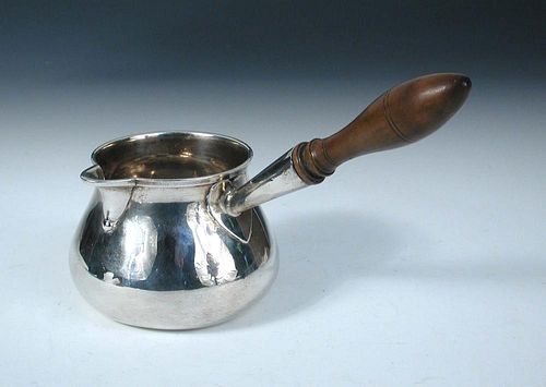 A George III silver brandy saucepan, by Charles Wright, London 1773, of plain baluster form with tur
