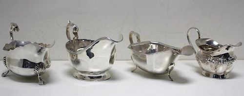 A small silver sauce boat, by Collingwood & Sons Ltd, Birmingham 1935, of oval panelled form raised