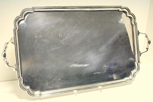 A small silver tray, by Roberts and Belk, Sheffield 1942, of plain rectangular shape with moulded ed