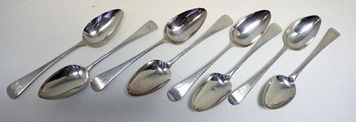A matched set of eight George III silver Old English pattern table spoons, five by William Sumner, L