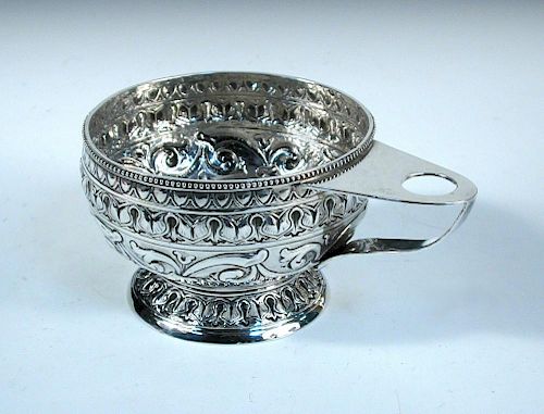A small Arts and Crafts bowl by Nathan & Hayes, Chester 1911, circular and embossed with bands of fo