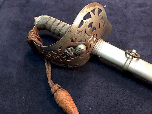 A 19th century officer's sword by Thurkle, the blade decorated with Northumberland V Fussiliers batt