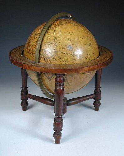 A Smith's Terrestial 10inch table Globe, 'containing all the most recent discoveries', varnished gor