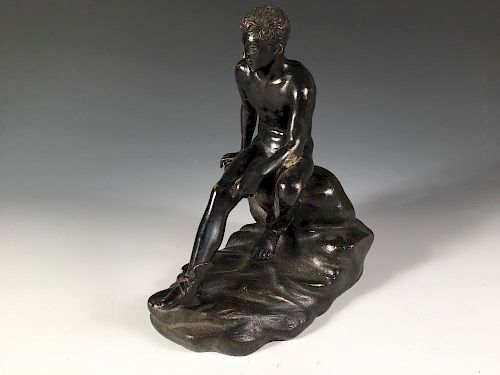 A 19th century bronze model of Mercury seated, modelled sitting upon a rock 22 x 20cm (9 x 8in) <br.