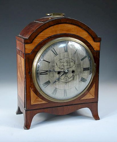 John Everett, London, a mahogany and satinwood banded bracket clock, the breakarch top with handle a