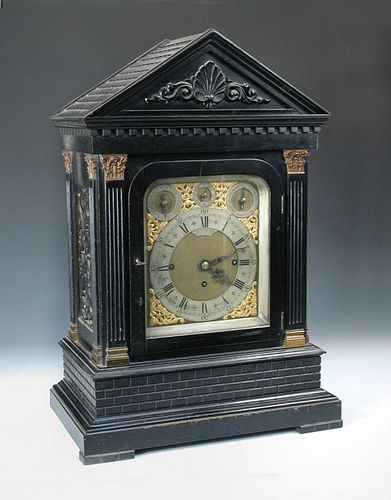 Thomas Russell & Son, London, an imposing Victorian ebonised case chiming clock, the architecturally
