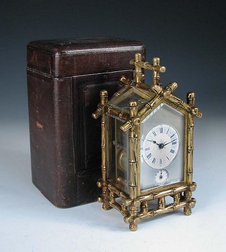 A gilt brass bamboo case carriage clock, circa 1890, with repeat and alarm, silvered platfom lever e