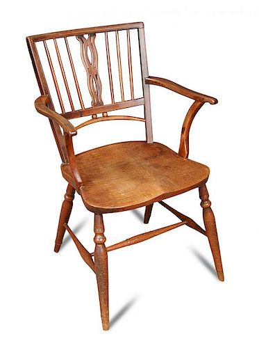An early 19th century yew wood and ash Mendlesham chair, with pierced splat and boxwood line inlaid