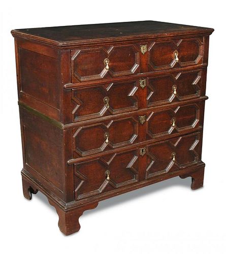 A James II oak chest, with moulded drawer fronts in two halves, brass pear drop handles and brass es