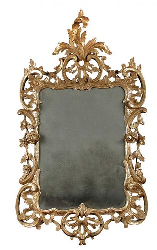 An 18th century carved giltwood framed wall mirror, bevelled mirror plate, regilded carved frame in