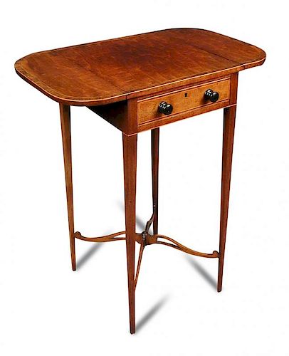 A Sheraton partidgewood drop-leaf table, crossbanded in rosewood, fitted a single drawer, later turn
