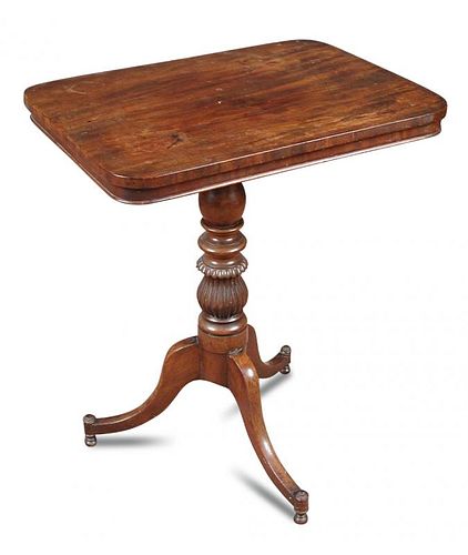 A Regency mahogany square top pedestal table, on a turned and gadroon moulded column and three splay