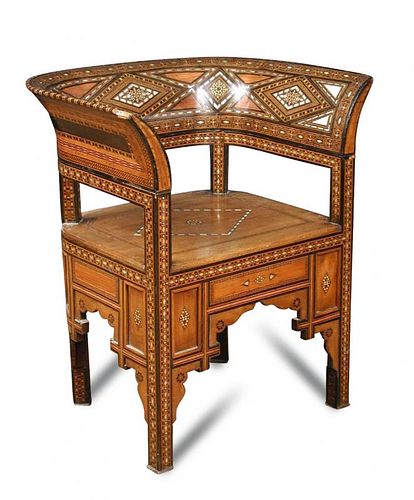 A late 19th century Damascus armchair, with geometric inlays in various woods and mother-of-pearl 74