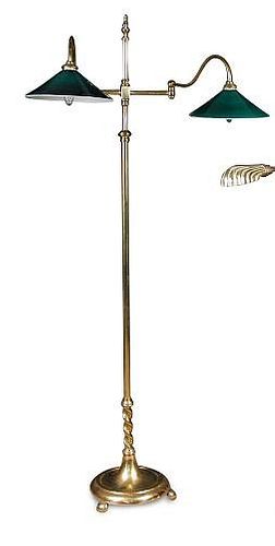 A brass two branch floor standing reading light, the branches with green glass shades 168cm (66in) <