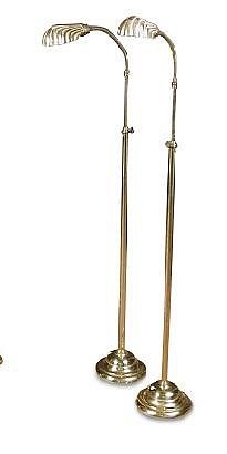 A pair of Edwardian height adjustable brass reading lights with shell moulded shades (2) <br. <br>Th