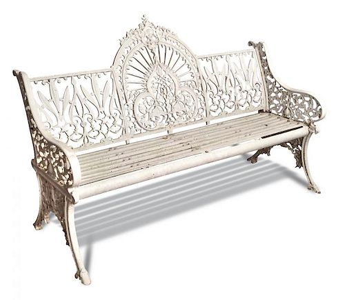 A Coalbrookdale cast iron garden seat, circa 1860 a design with strong Indian influence, profusely d