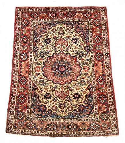 An Isfahan rug, 227 x 154cm (89 x 60in) <br. <br>Border fringe losses at one end, overal good levels
