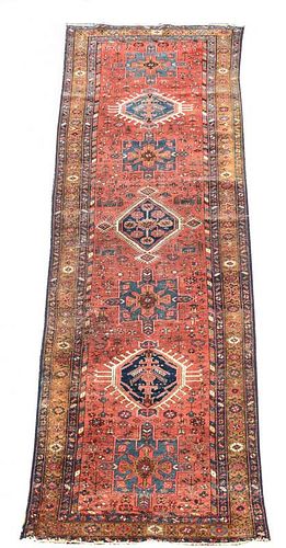 A Karadja runner, NW Persia 425 x 138cm (166 x 54in) <br. <br>Good colour, one small hole, low level