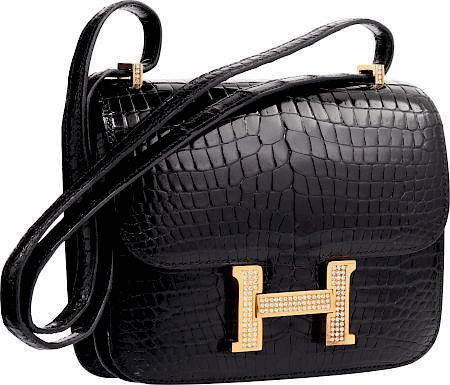 Hermes Extraordinary Collection 18cm Shiny Black Porosus Crocodile Double Gusset Constance Bag with 18K Yellow Gold Hardware Very Good Condition 7" Wi