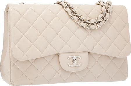 Chanel Beige Quilted Caviar Leather Jumbo Single Flap Bag with Silver Hardware Excellent to Pristine Condition 12" Width x 8" Height x 3" Depth
