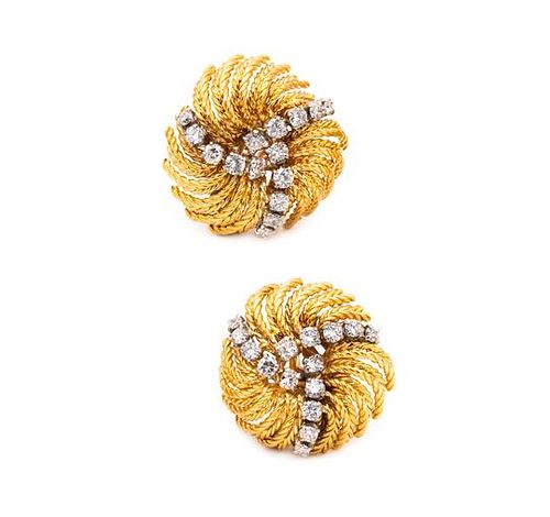 Boucheron Paris clip-earrings in18 kt gold with 2.40 Cts in diamonds