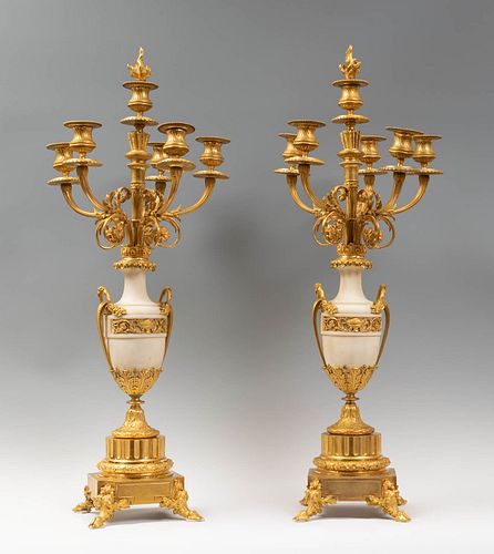 Pair of Napoleon III candlesticks, ca. 1870. 
Gilded broce and marble.