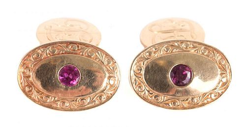 A Pair of Gentleman's Gold and Ruby Cufflinks