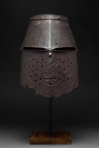 A MEDIEVAL IRON GREAT HELM