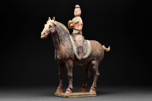 A CHINESE TANG DYNASTY TERRACOTTA HORSE AND RIDER WITH TL TEST