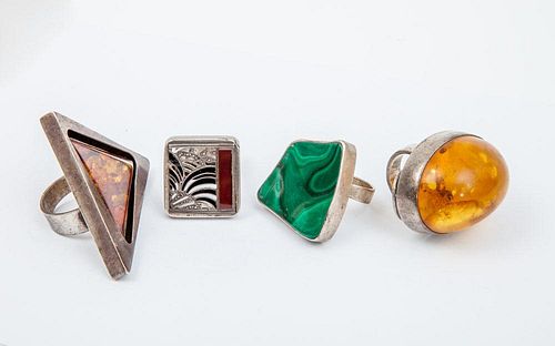 GROUP OF FOUR SILVER-MOUNTED FINGER RINGS