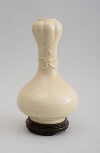 CHINESE MING TYPE IVORY GLAZED AND RELIEF DECORATED PORCELAIN GOURD-FORM VASE