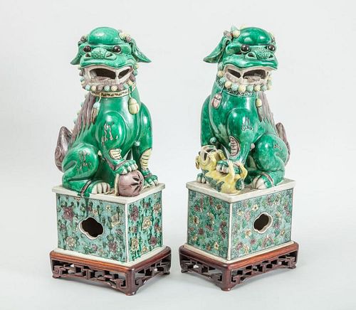 PAIR OF CHINESE GLAZED BISCUIT FIGURES OF FU DOGS