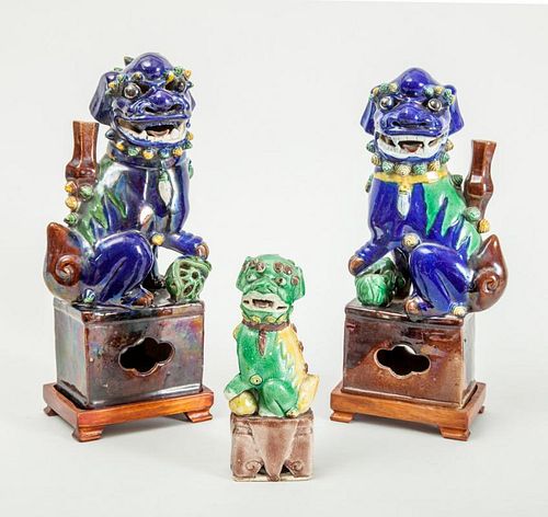 ASSEMBLED PAIR OF CHINESE BLUE-GLAZED FIGURES OF FU DOGS AND A SINGLE GREEN-GLAZED DOG