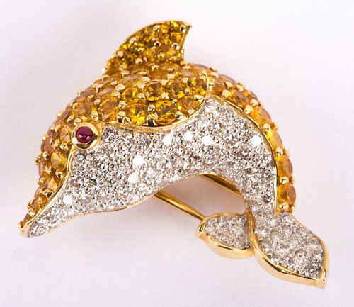 A Yellow Sapphire and Diamond "Dolphin" Brooch