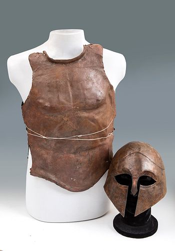 Greek helmet and pectoral, V-IV century BC. 
Bronze. 
Measures: 22 x 20 x 22 cm; 55 x 32 cm (front pectoral); 52 x 36 cm (rear pectoral).