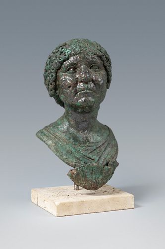 Portrait bust. Rome, first century A.D. 
Bronze. 
Provenance: collection P.V. Madrid, 1970's. 
In good condition, without restorations. 
Measures: 20.