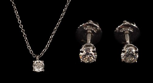 A Tiffany & Co. Diamond Pendant and Stud Earrings